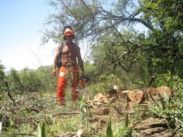 John Comley at age 45 cutting trees and remaining physically active
