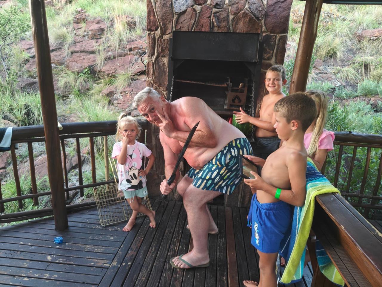 John Comley in his 60s with his grandson Carlo